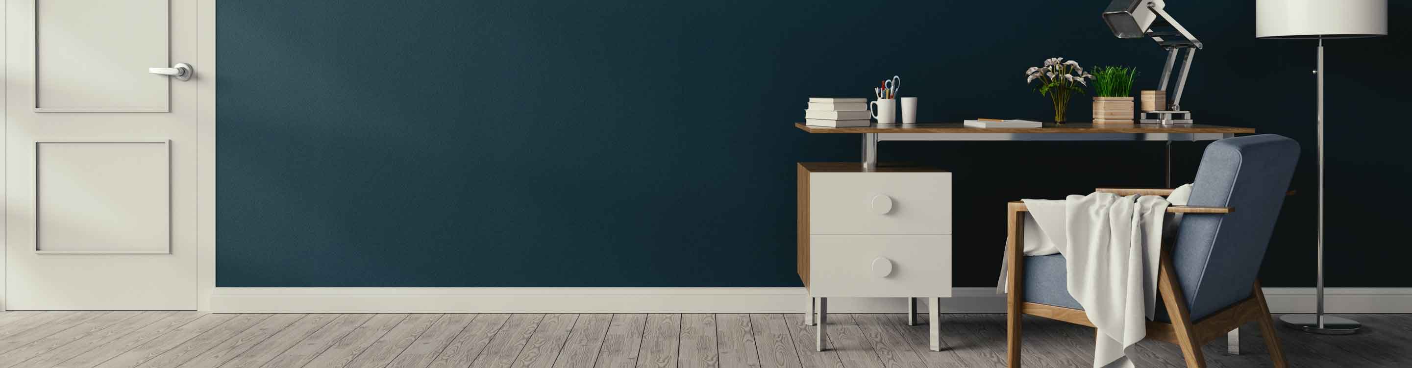 dark blue painted wall in home office