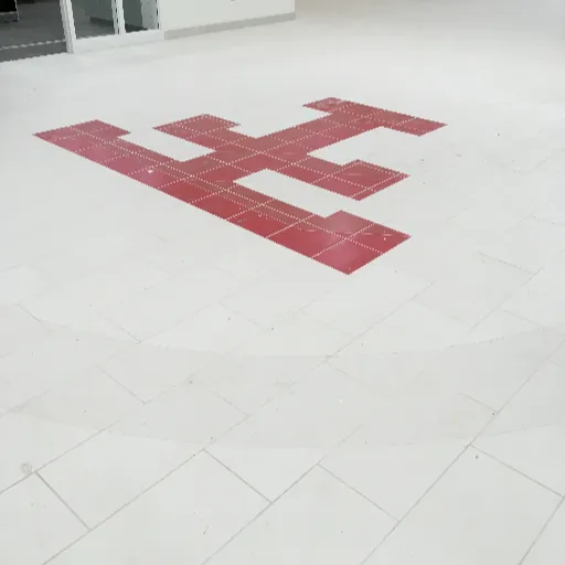 Patterned tile floor logo by Floor to Ceiling 